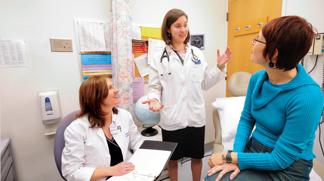 From left: Dr. Karen Hauer, third-year medical student and PISCES participant Jenny Cohen and patient Chris Krajewski discuss Krajewski's medical care and treatment.