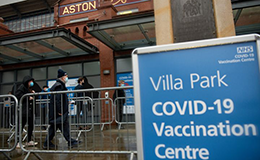 line at a british covid-19 vaccination center