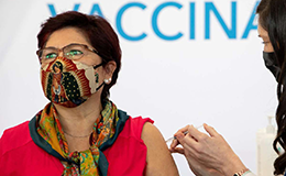 woman receiving pfizer vaccine