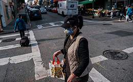 woman wearing two masks