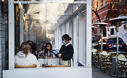 patrons dining outdoors